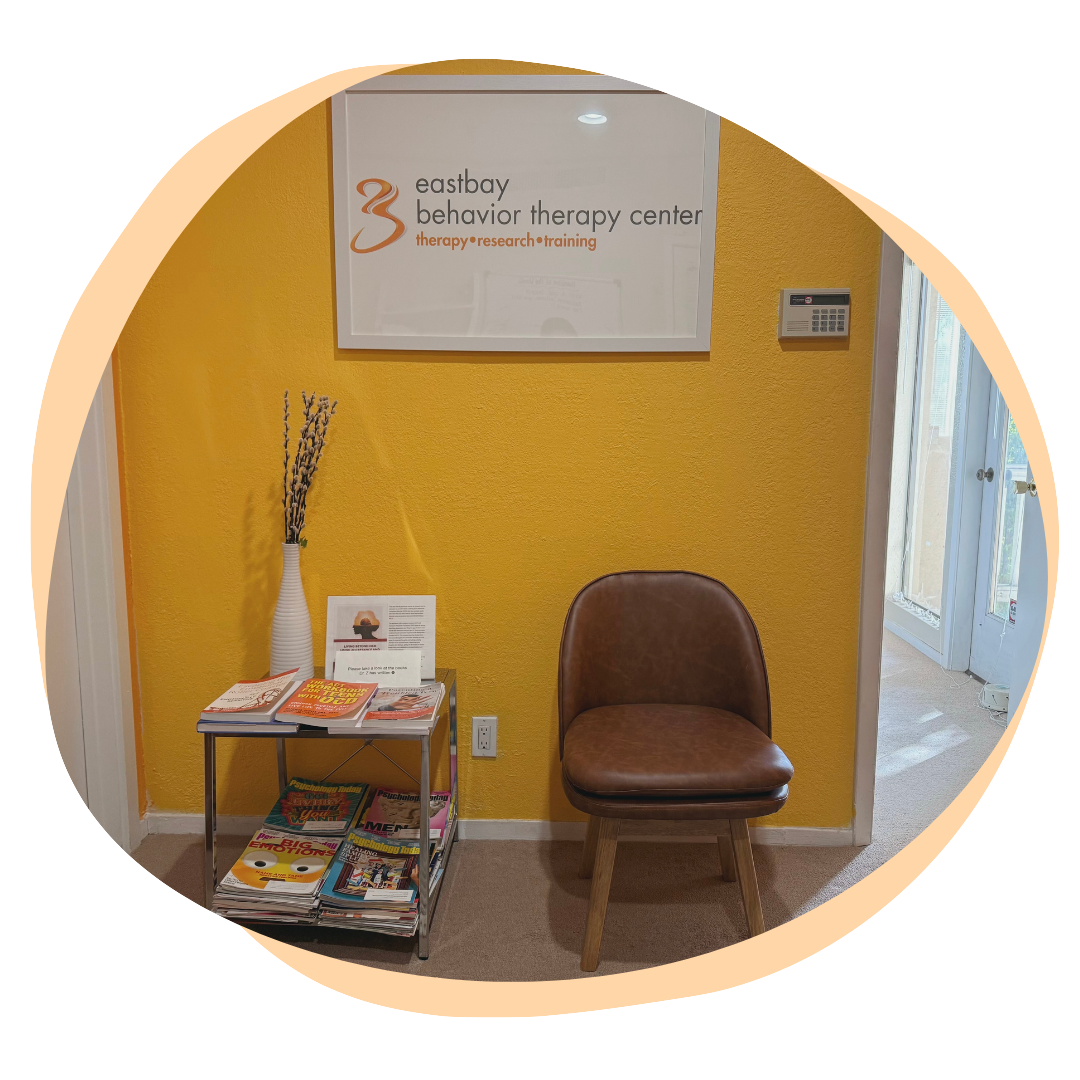 a white chair next to a table